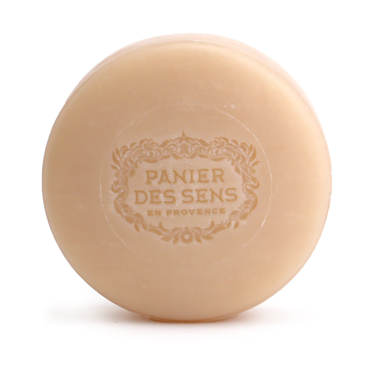 Panier des Sens shaving soap puck showing the top logo impression 