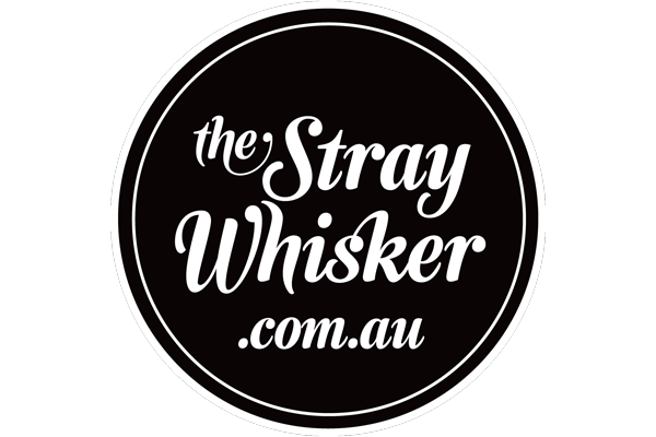The Stray Whisker logo in a black circle