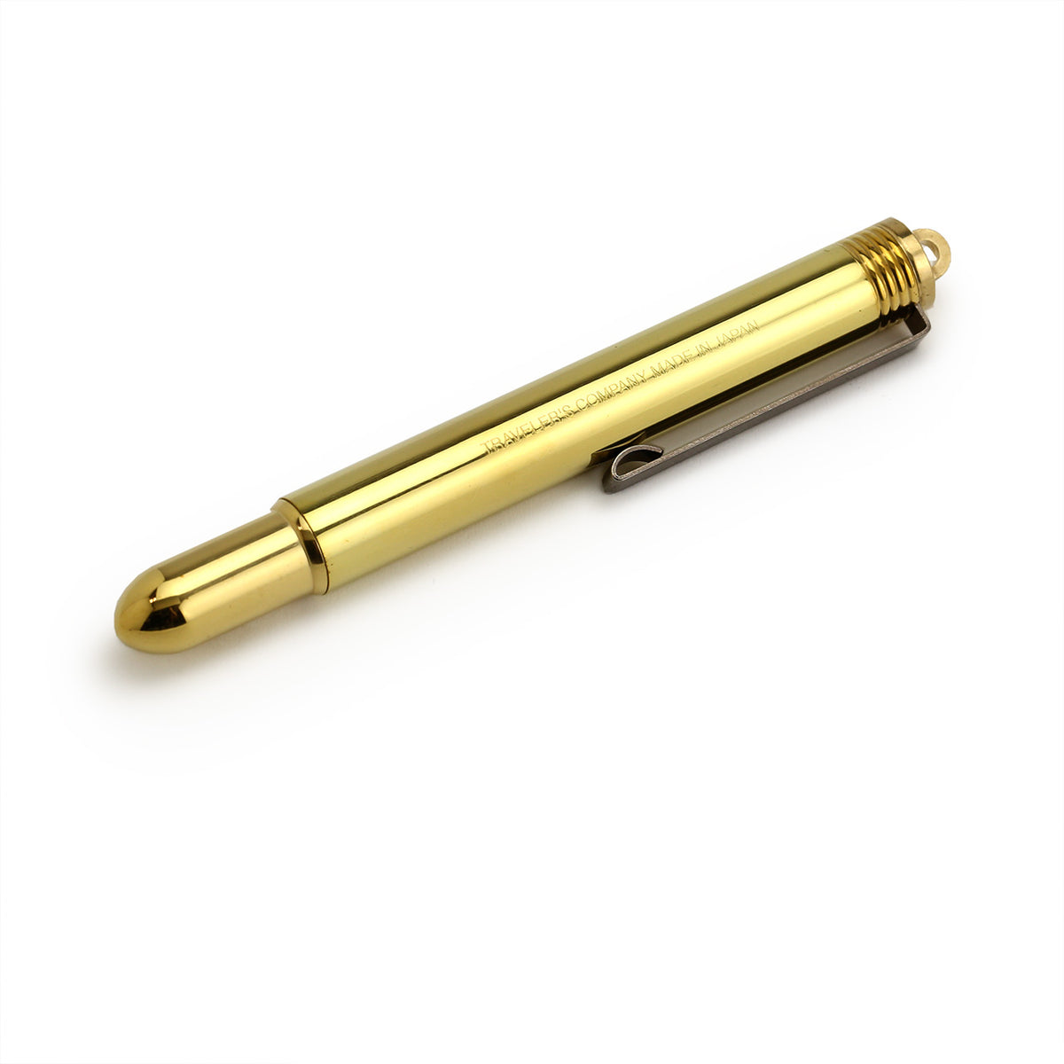 compactly closed brass fountain pen showing the rounded end, hanging loop and rustic clip