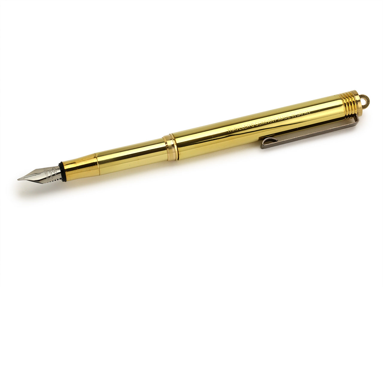 brass fountain pen fromTraveler's company Japan shows three-quarter side view fully posted