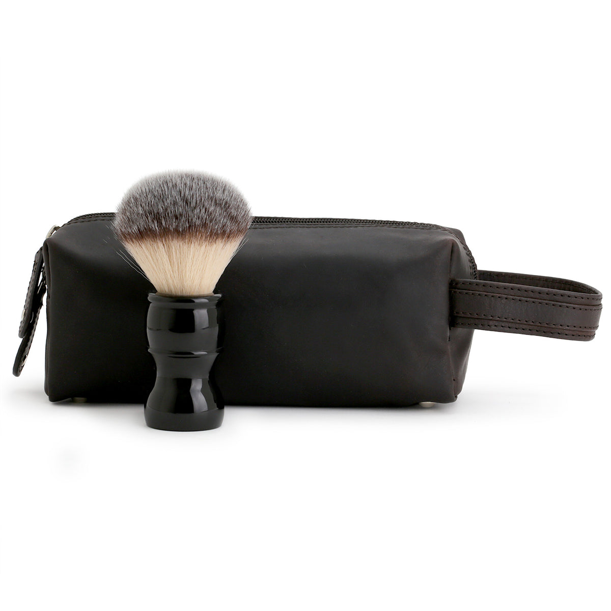 Compact Brown Leather Dopp bag, side view with shaving brush for size comparison