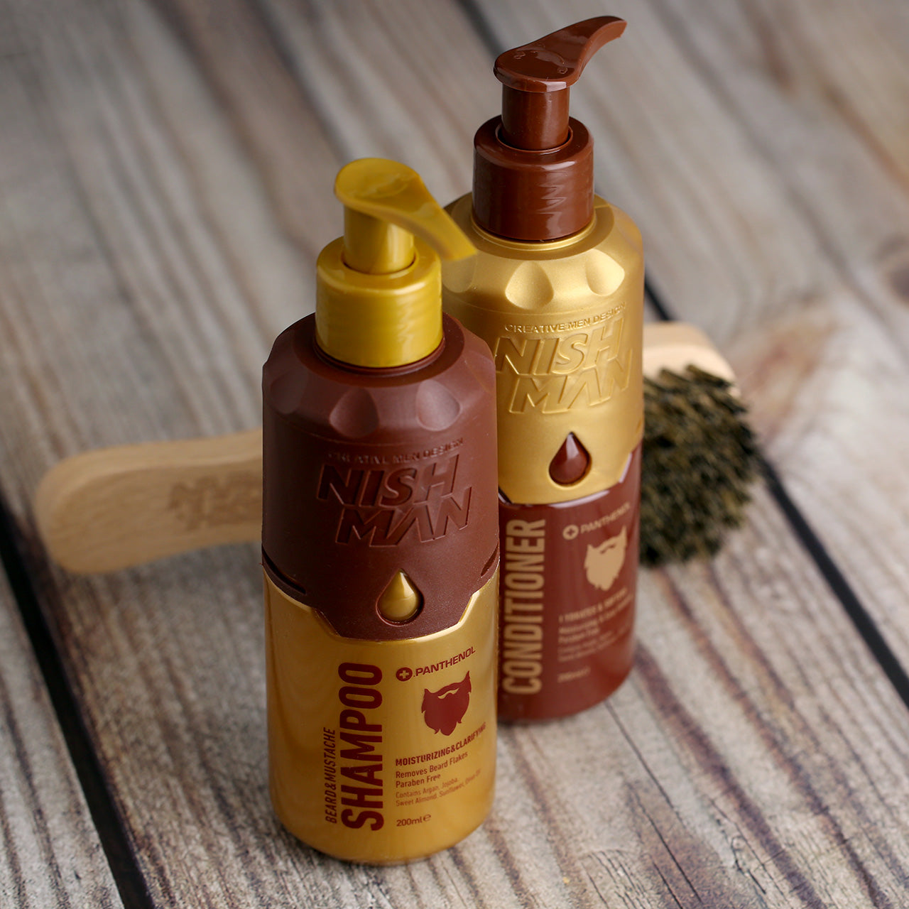 Nishman Beard & Moustache Shampoo in a gold and chocolate bottle with pump dispenser