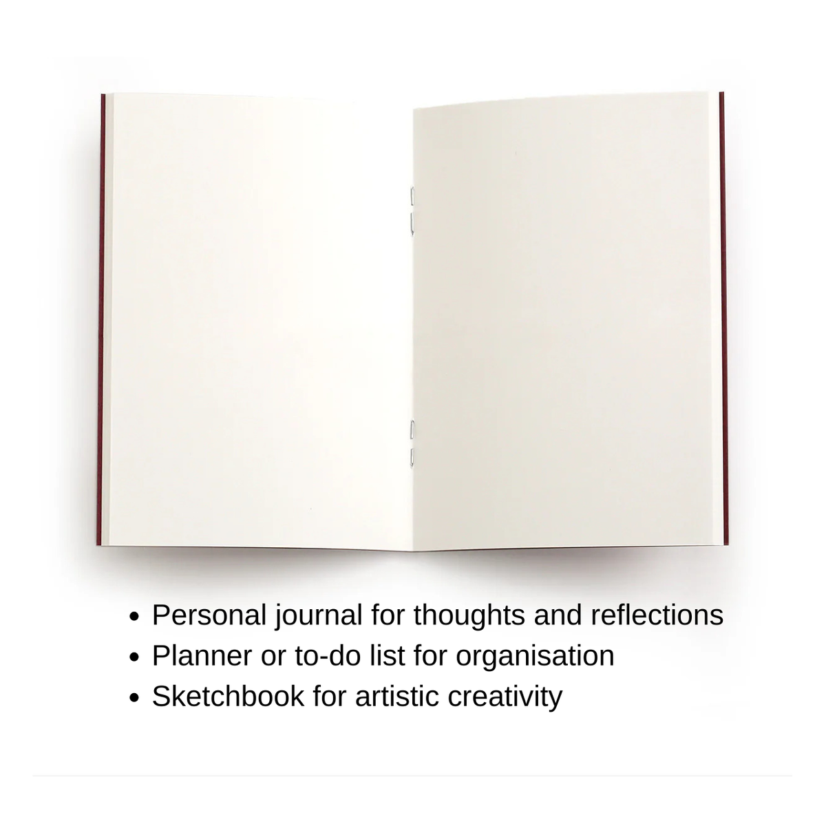 Open notebook with blank pages on a white background