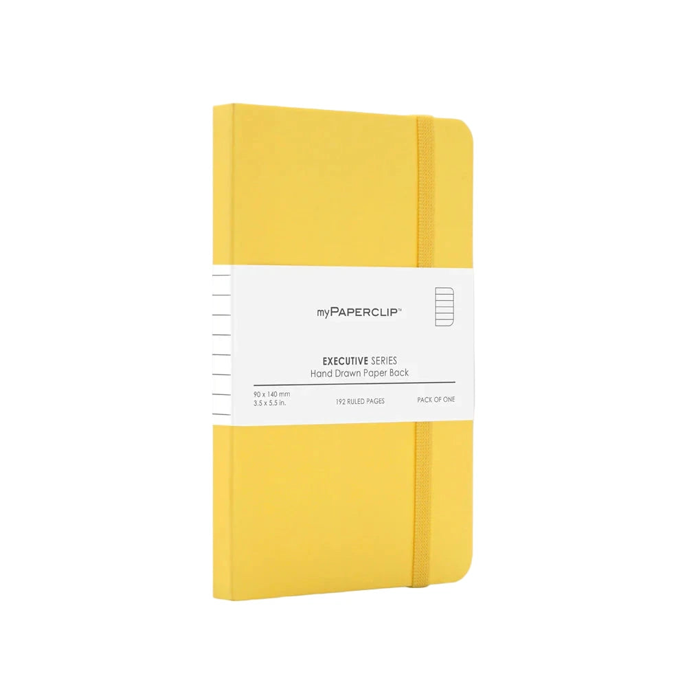 Yellow notebook with a white label on a white background