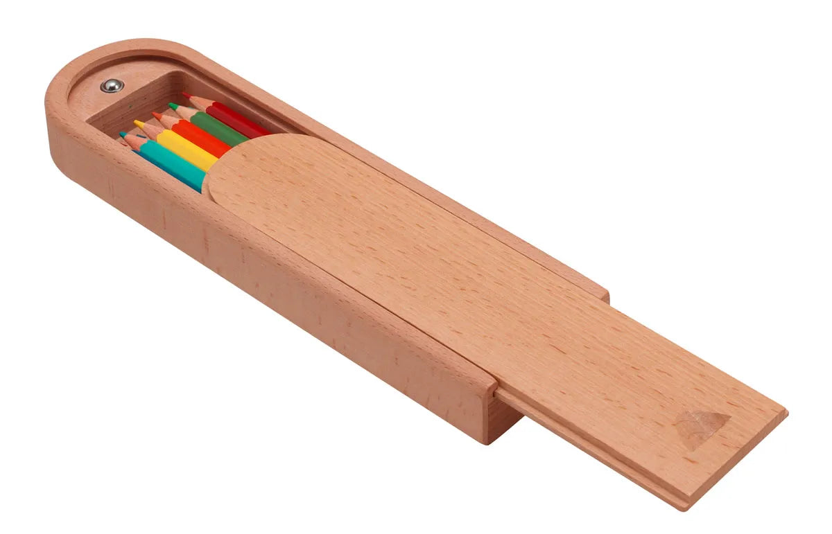 Wooden pencil holder with colorful pencils on a white background