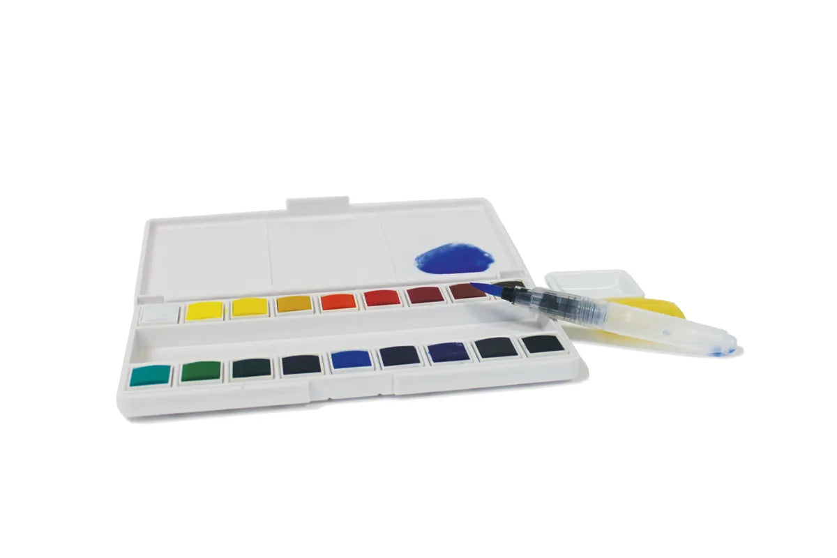 Watercolor paint set with a variety of colors on a white background
