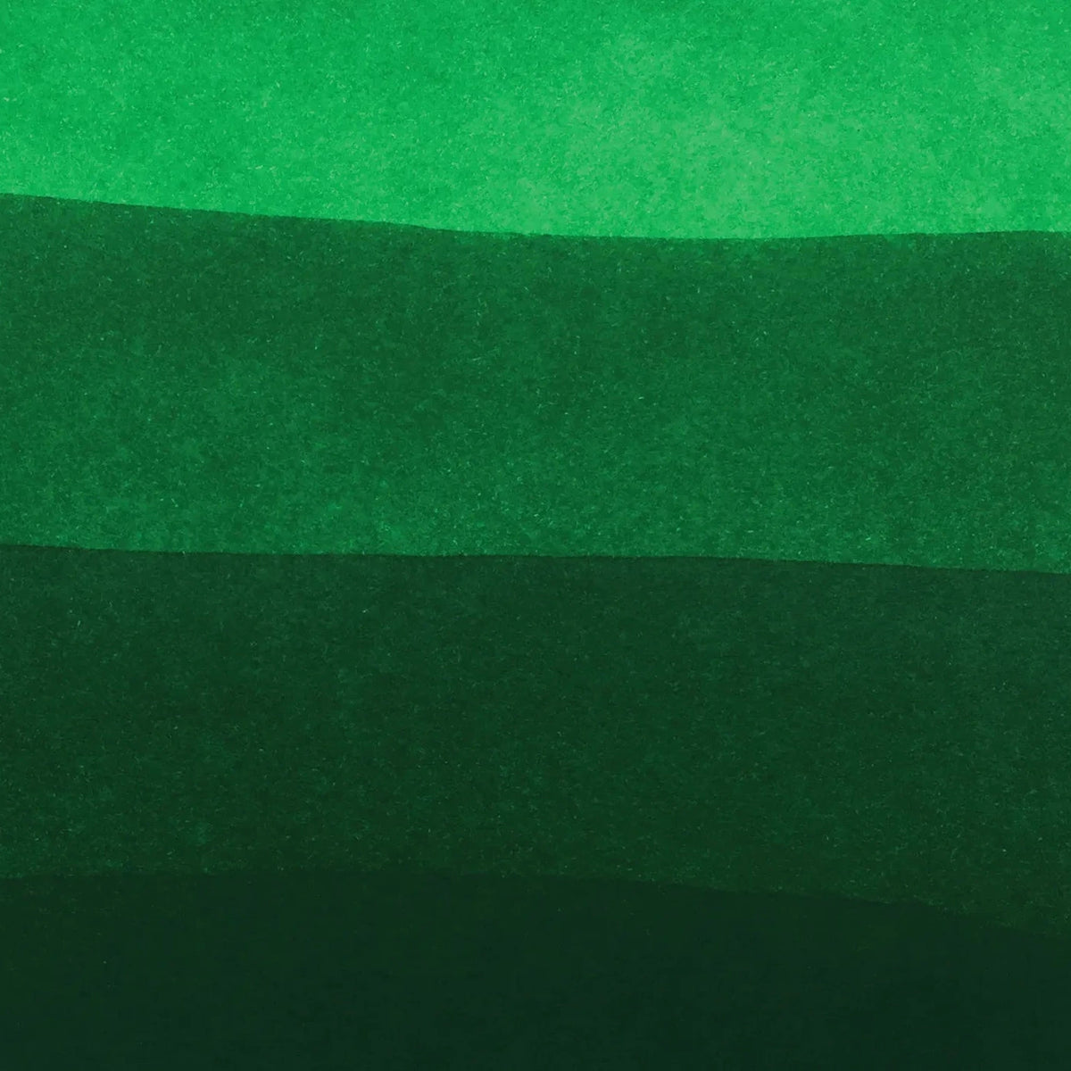 Close-up of green textured fabric with a focus on color and pattern.