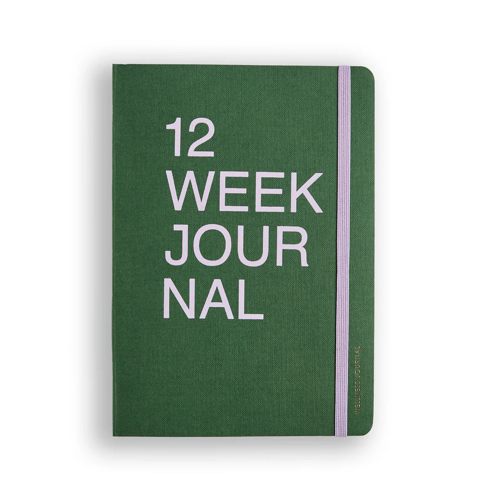 Green journal with '12 Week Journal' text on a white background