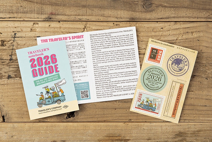 Traveler&#39;s Company 2026 Guidebook and accessories on a wooden surface