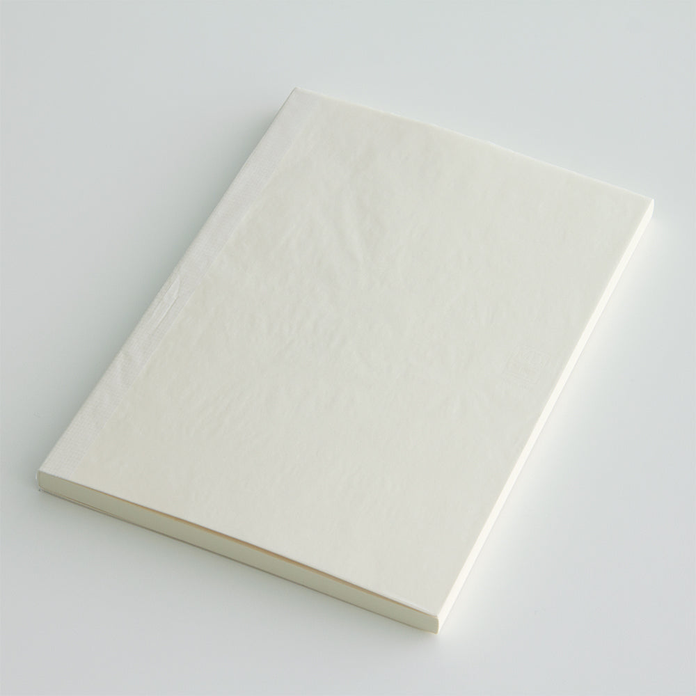 an unpackaged notebook showing the fine paper cover overlay