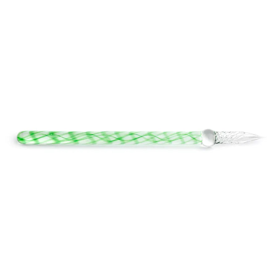 Decorative glass pen with green and white pattern on a white background