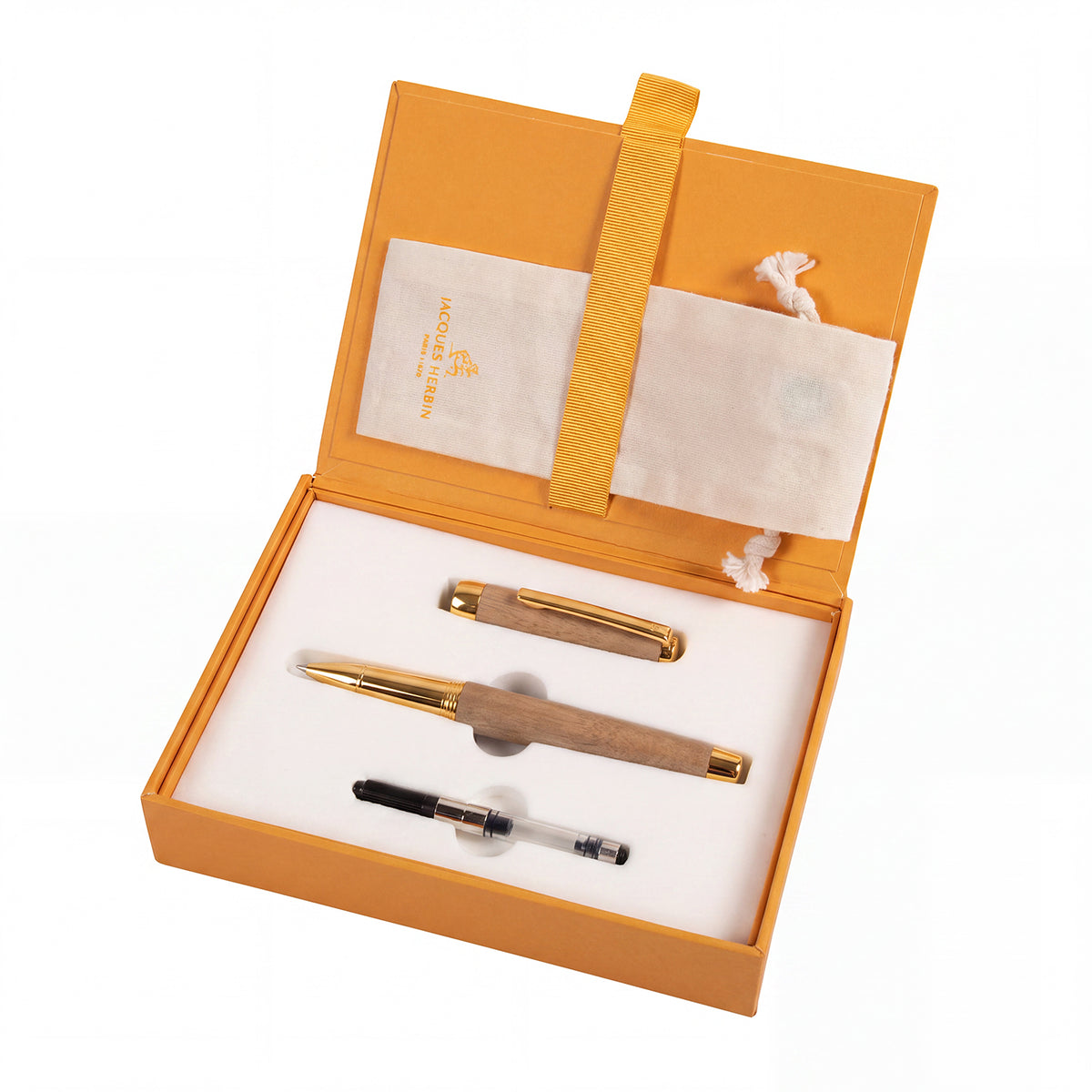 Set of pens in an open orange box with a white interior