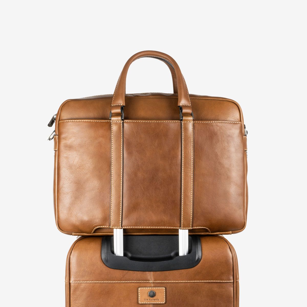 Jekyll &amp; Hide laptop case shown with a matching leather rolly-suitcase