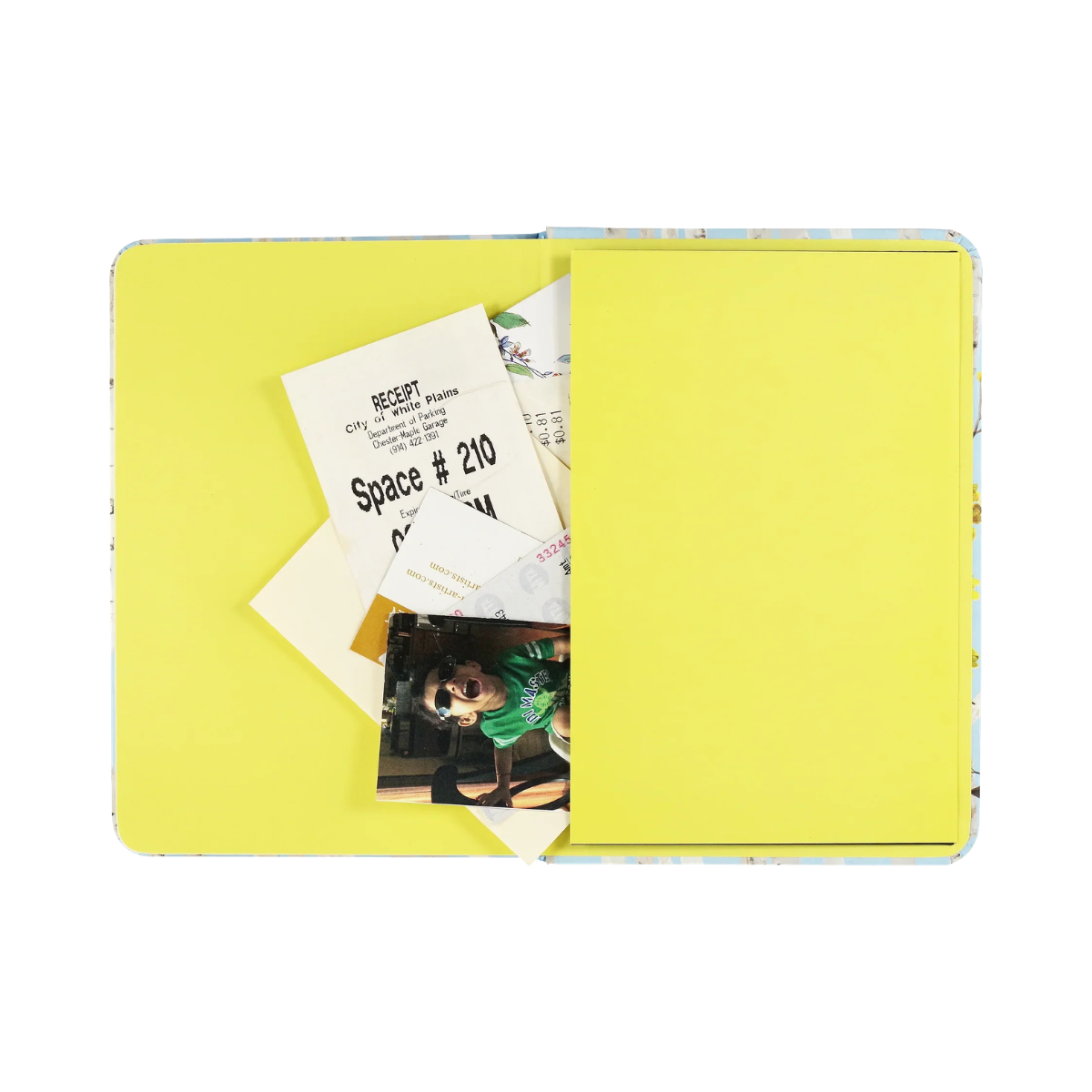 Yellow folder with documents and photos on a white background