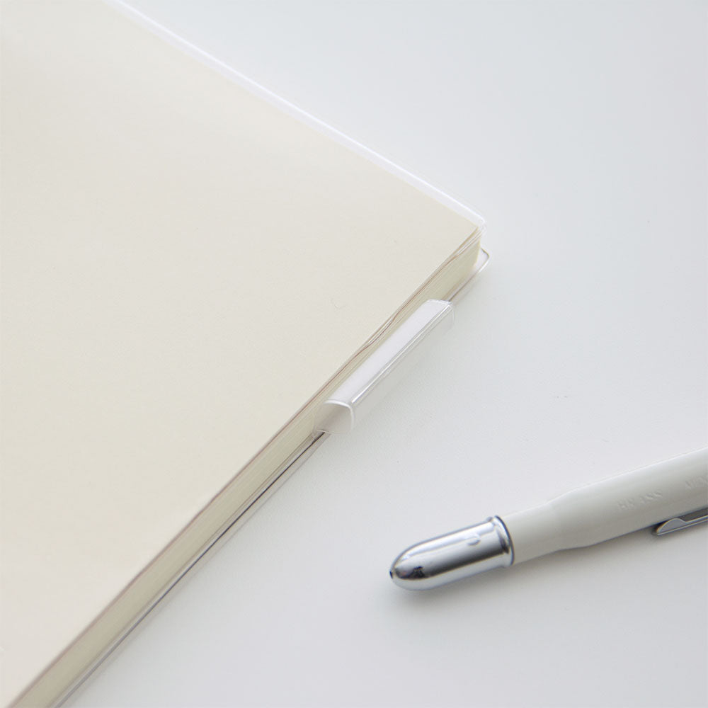 detail showing the pen-loop on the clear notebook cover