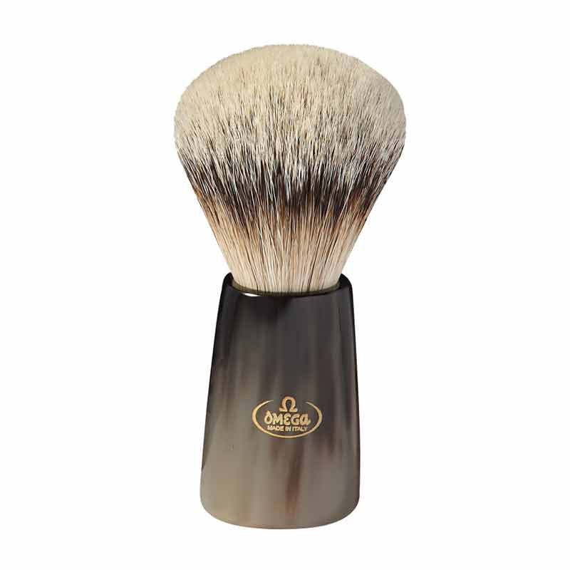 Shaving brush with black handle and gold Omega logo on a white background