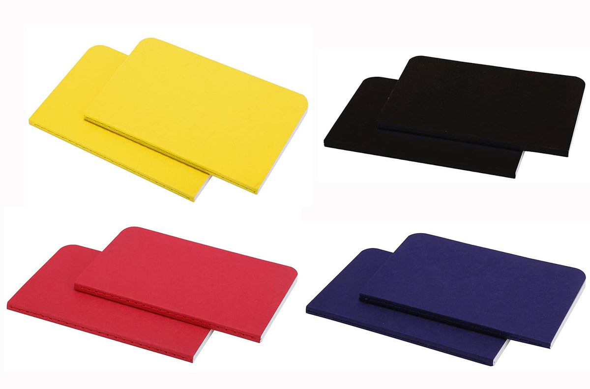 Four colorful notebooks in yellow, black, red, and blue on a white background