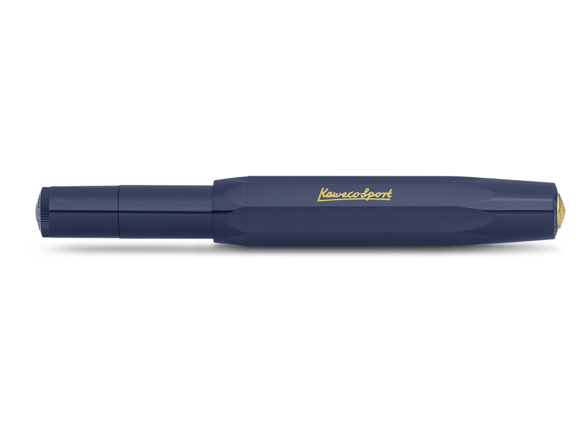 Side view of the navy classic Kaweco pen with gold finial and embossed logo on the faceted cap