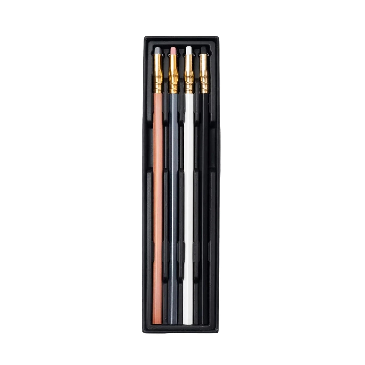 Set of for pens with gold accents in a black holder on a white background