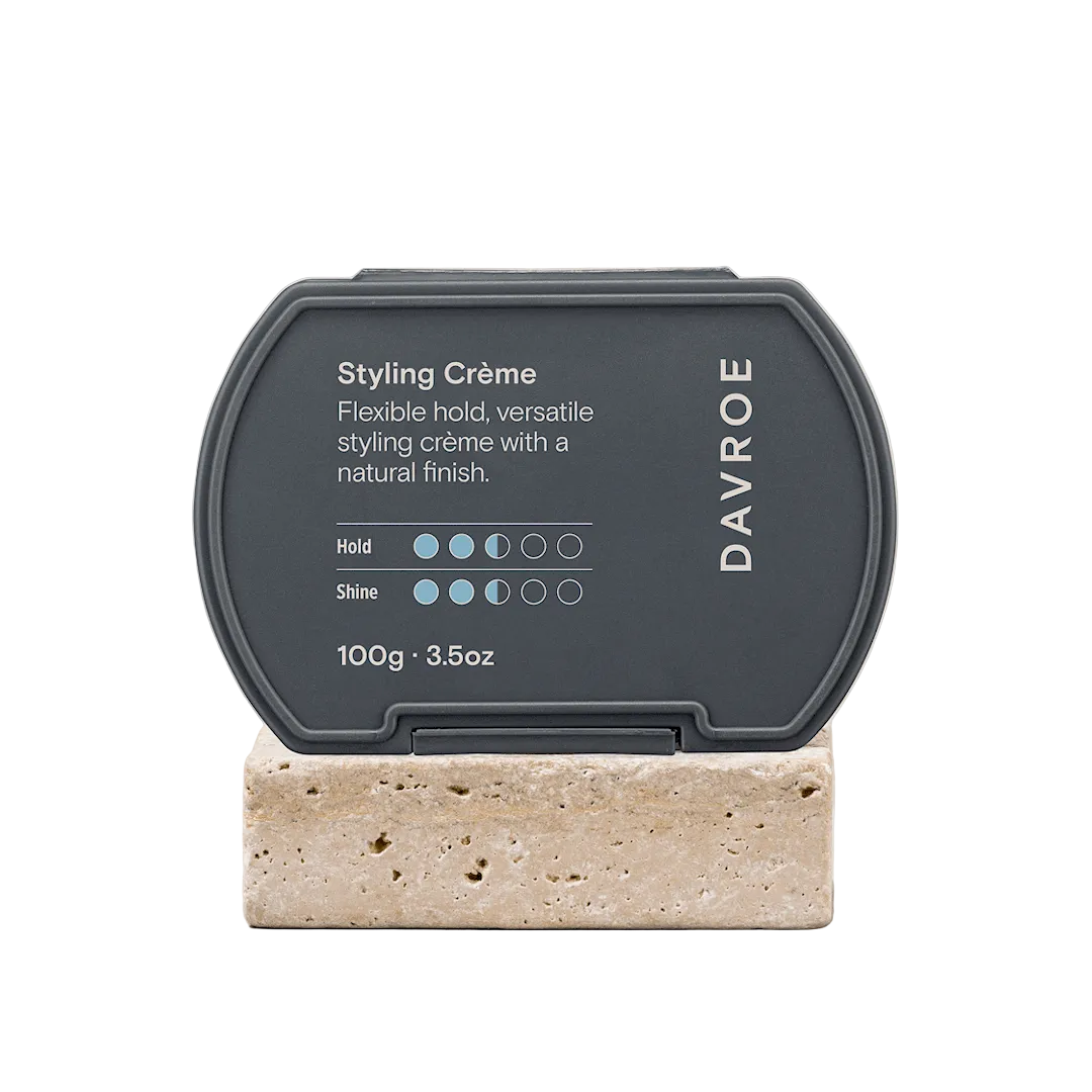 Davroe Styling Crème container on a stone block with a beige background