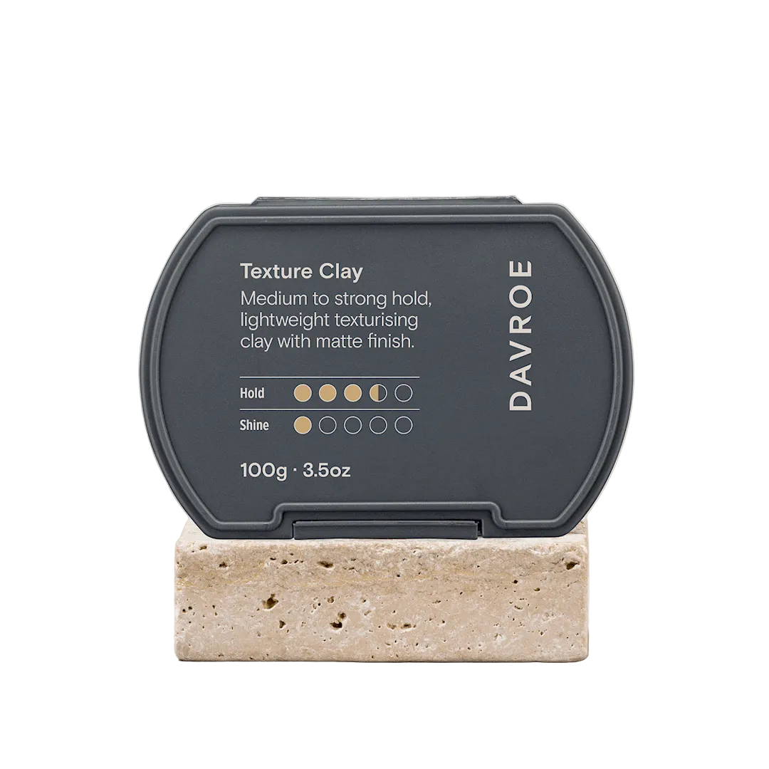 Davroe Texture Clay container on a stone block with a beige background