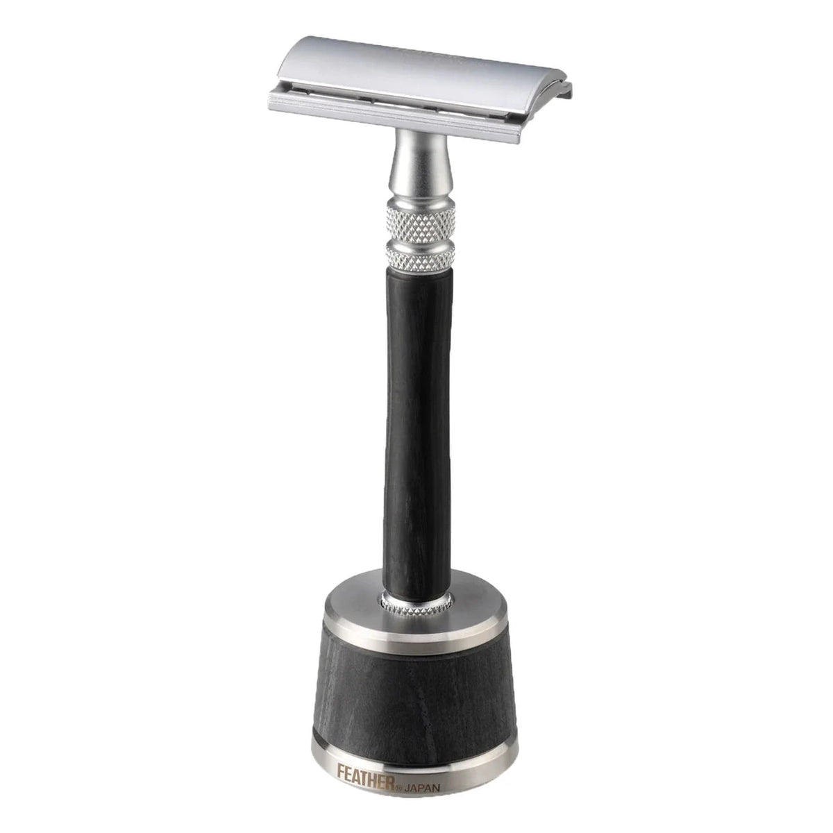 Shaving razor with black handle and silver accents on a white background