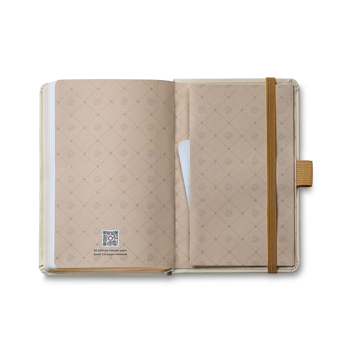Open notebook with quilted cover and brown strap on a white background