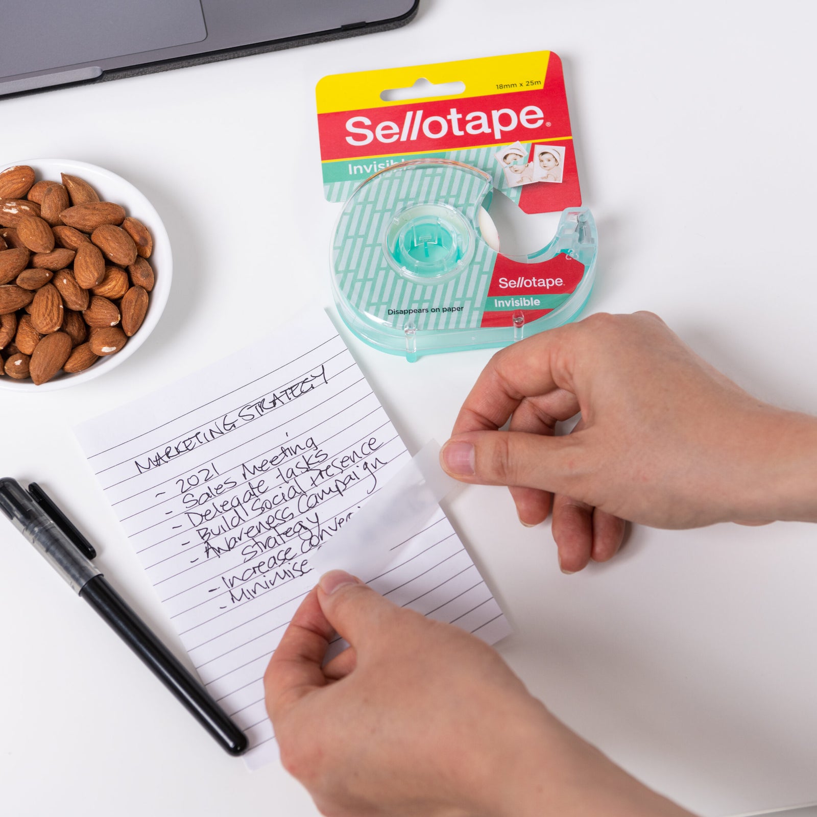 Sellotape Invisible tape packaging with two rolls on a white background