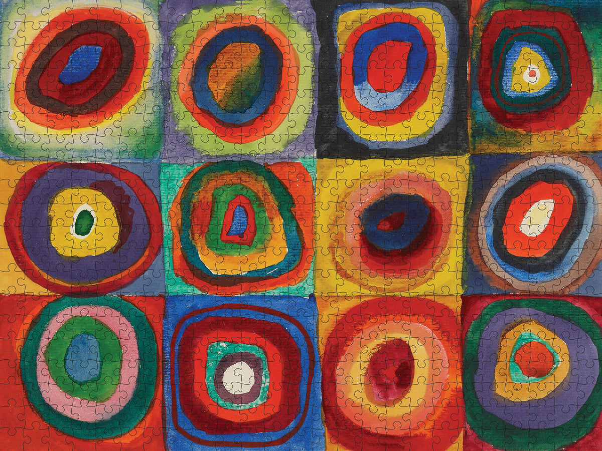 Colorful abstract pattern with concentric circles on a grid background