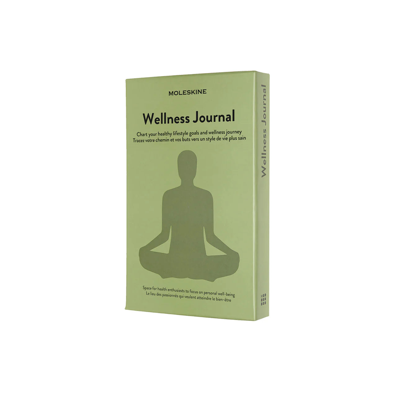 The Green slipcase of the Wellness Journal shows a large silhouette of a person in a yoga cross-legged seat or Lotus position