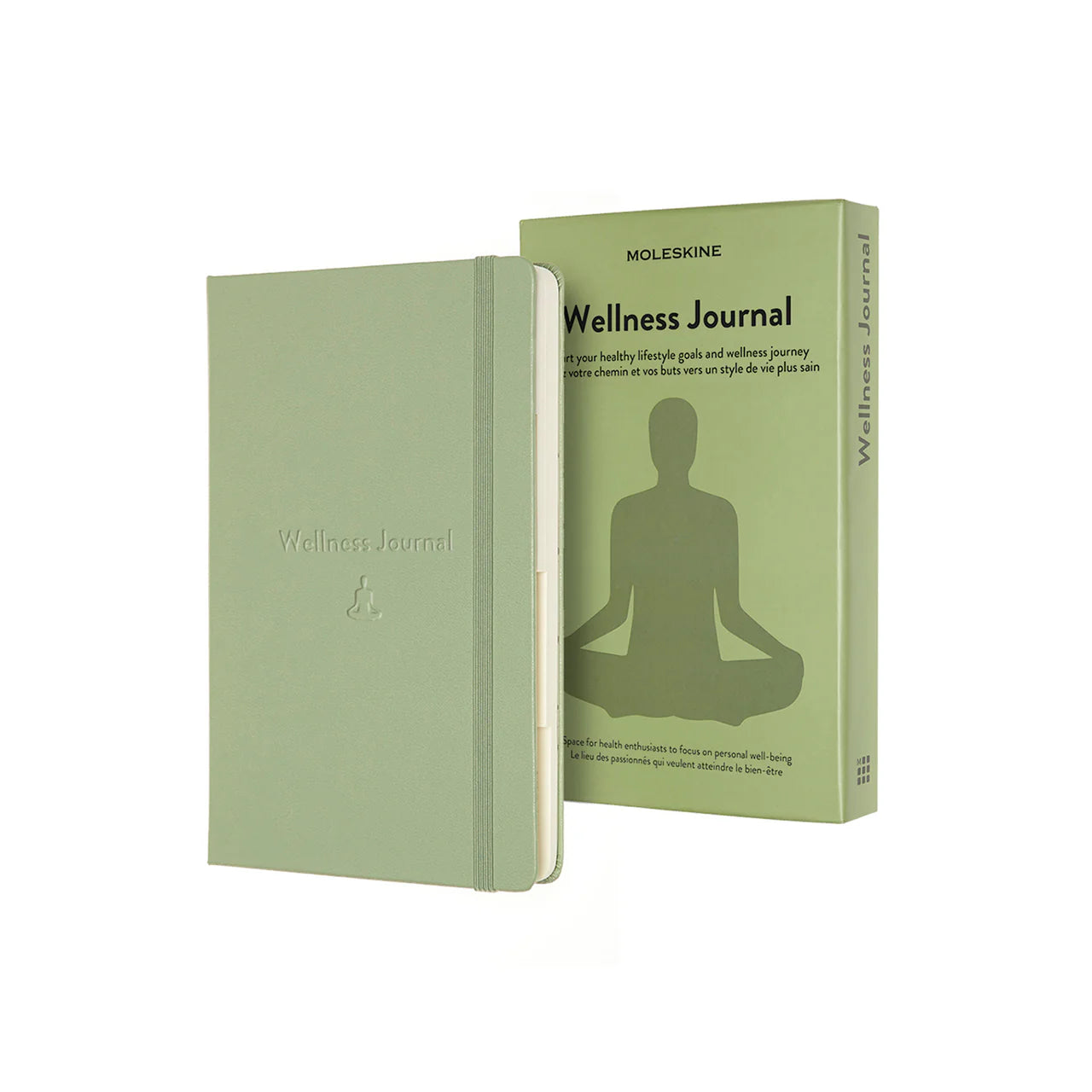 The Green slipcase of the Wellness Journal shows a large silhouette of a person in a yoga cross-legged seat or Lotus position