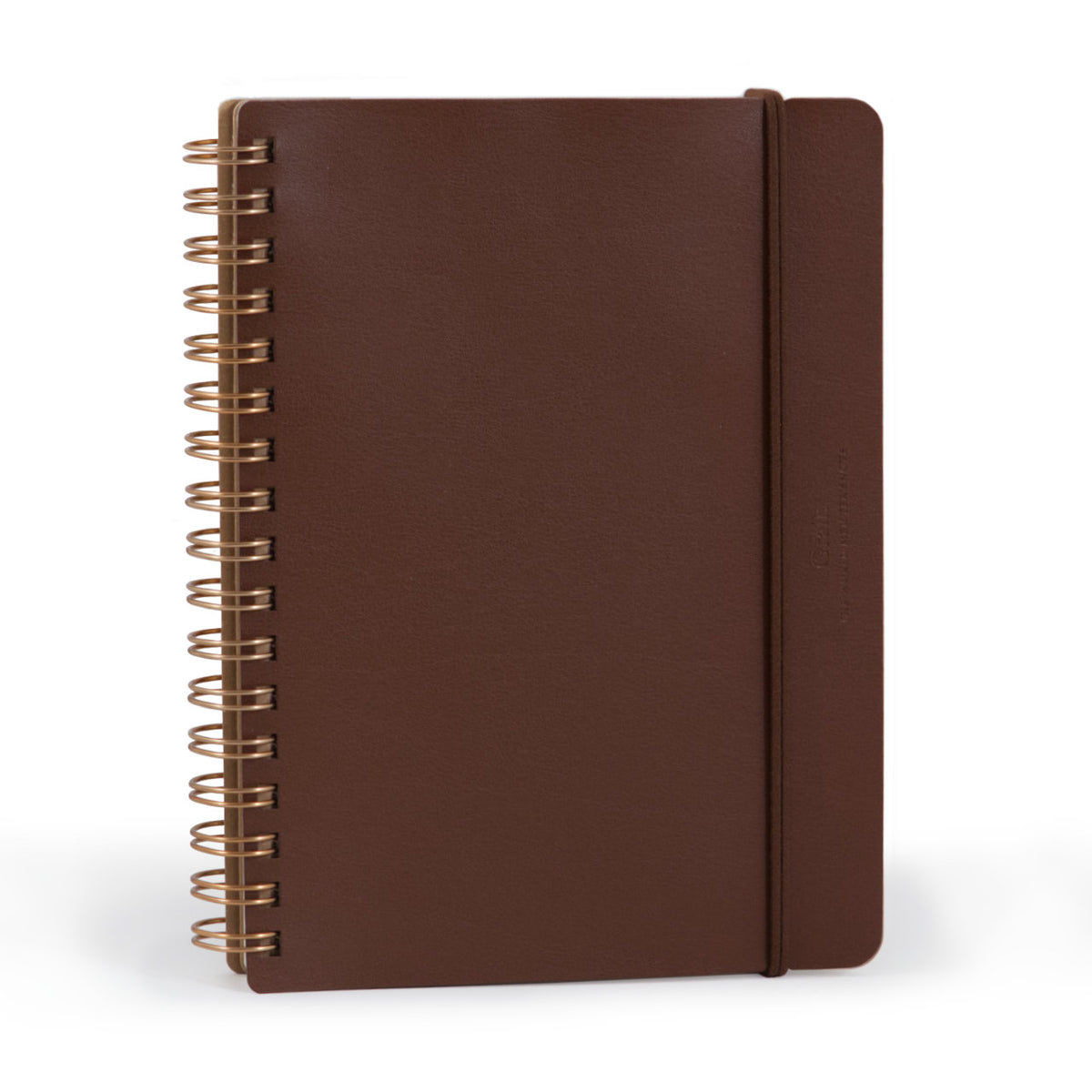 Front cover of a brown B6 notebook has recycled leather and a brown double strand elastic closure