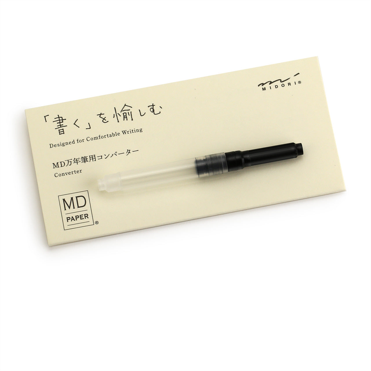 Midori converter for fountain pen on cream coloured card