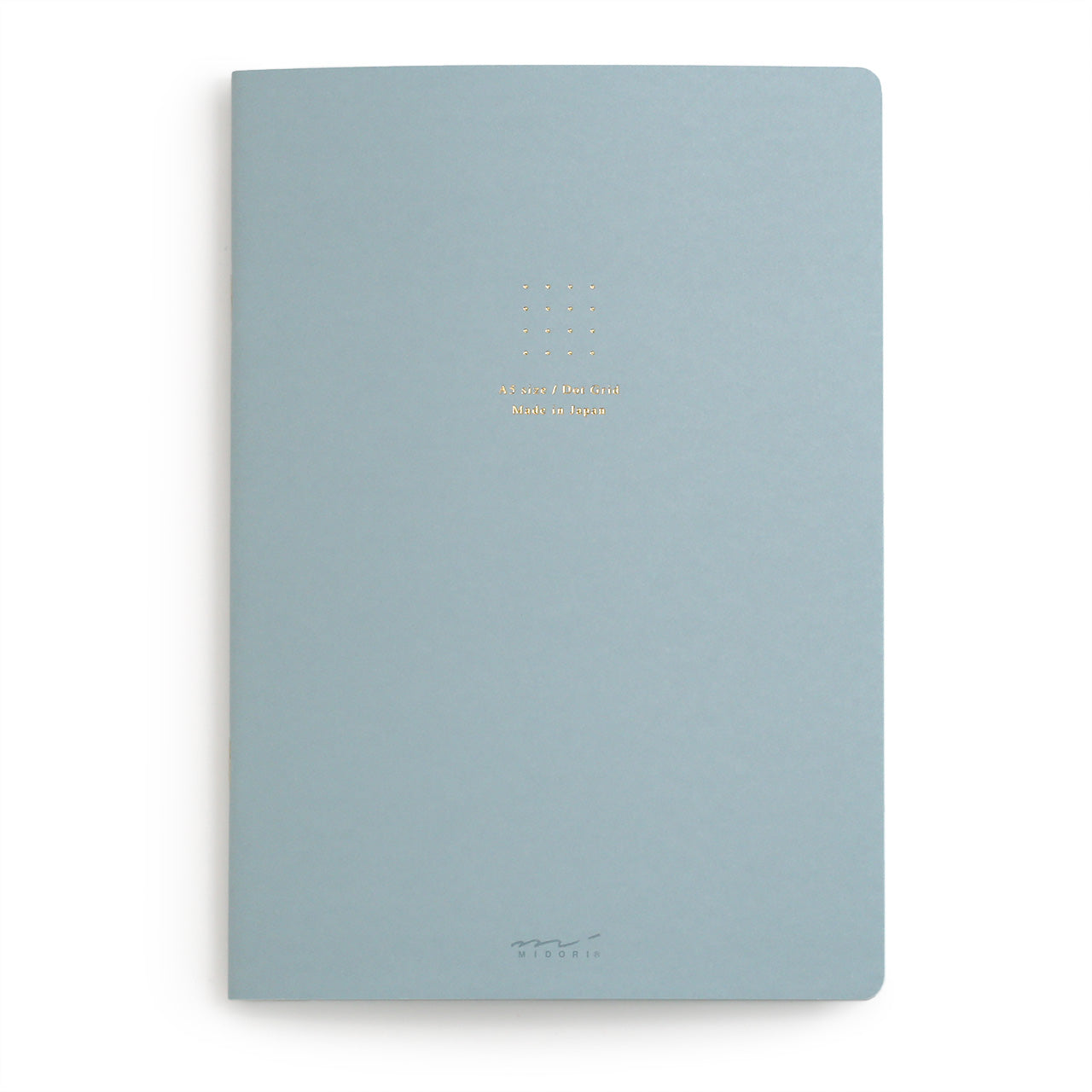 blue dot grid A5 notebook from midori with gold coloured foil stamping on the cover and gold coloured staples