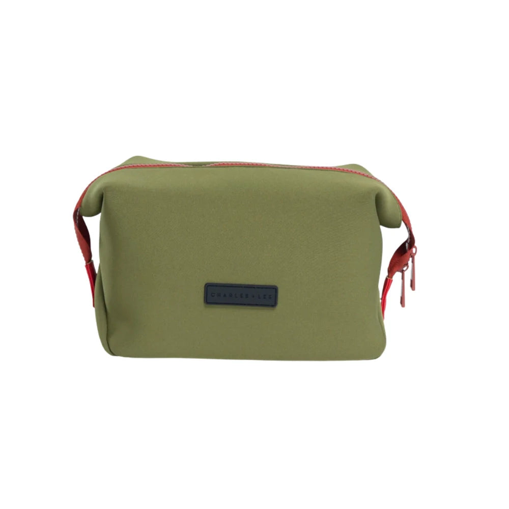 Khaki neoprene toiletry bag with red zip detail, and black Charles &amp; Lee label