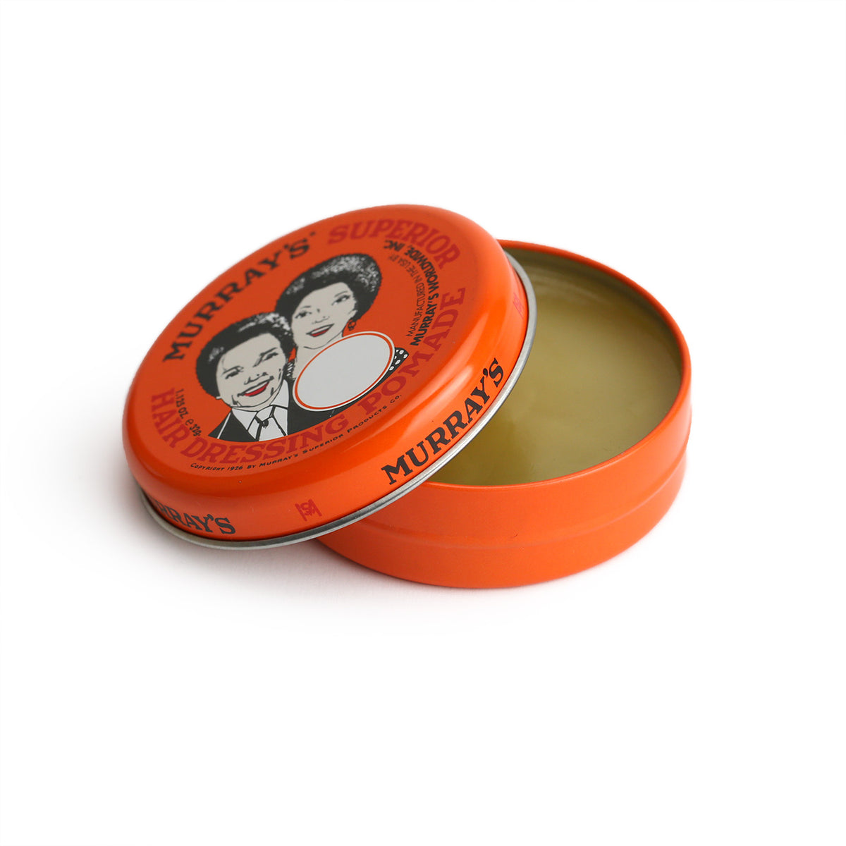 open small tin of murrays superior haair-dressing pomade showing the slick semi transparent product 