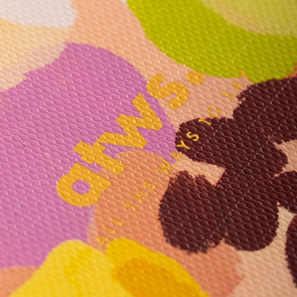 Colorful fabric with floral patterns and 'always' text.