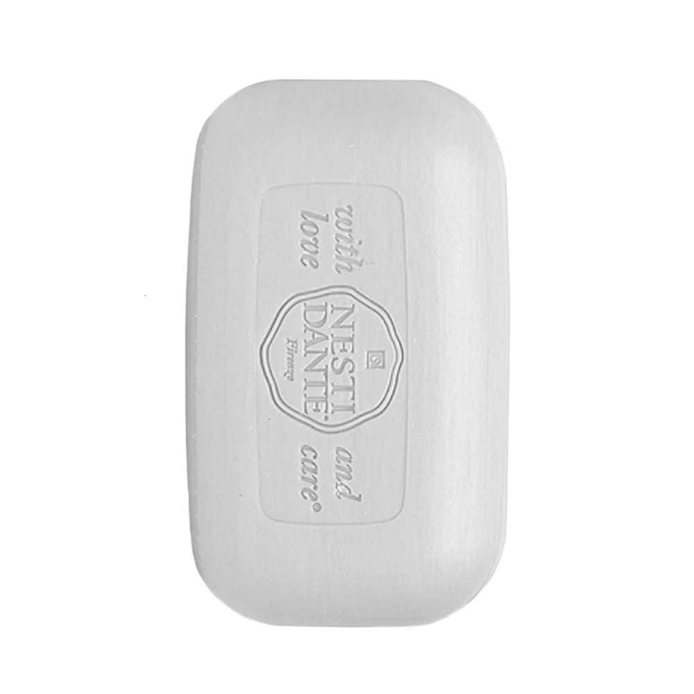 The cake of soap is very pale coloured grey with logo embossing