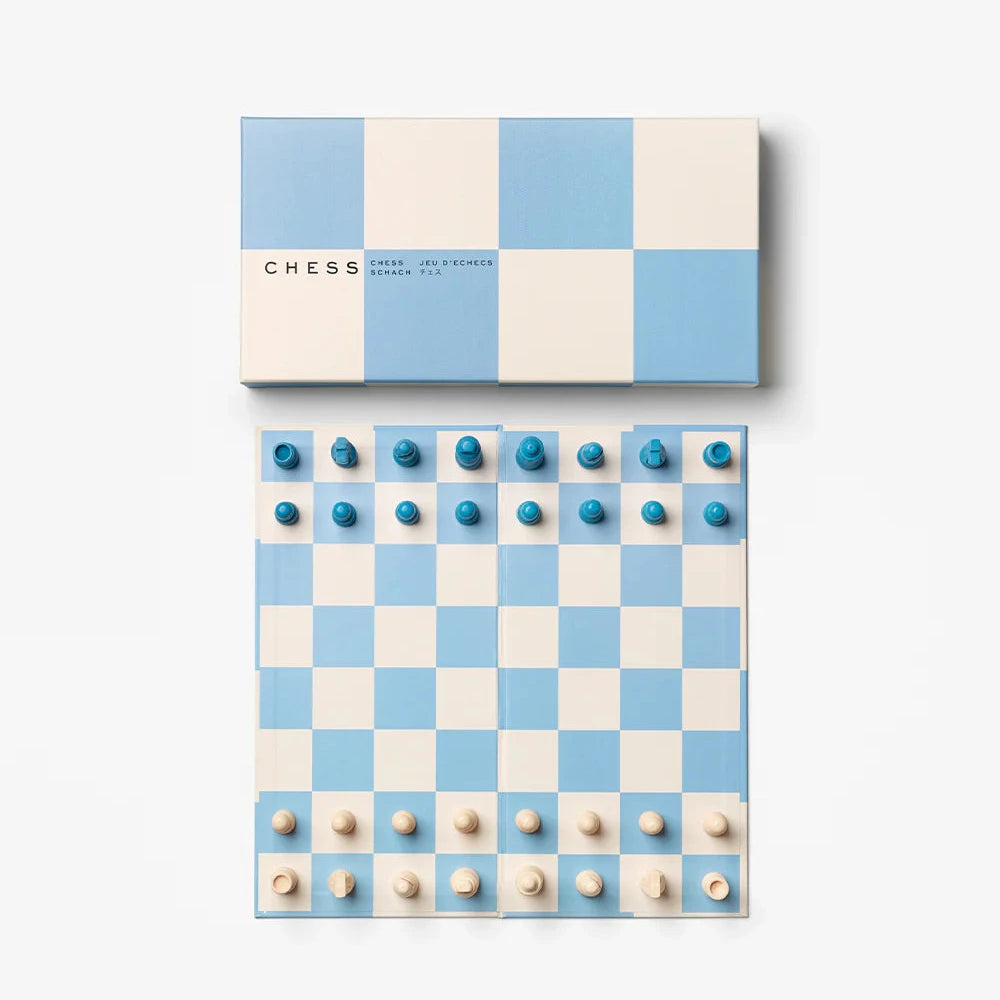 Checkered chessboard with blue and white pieces on a white background