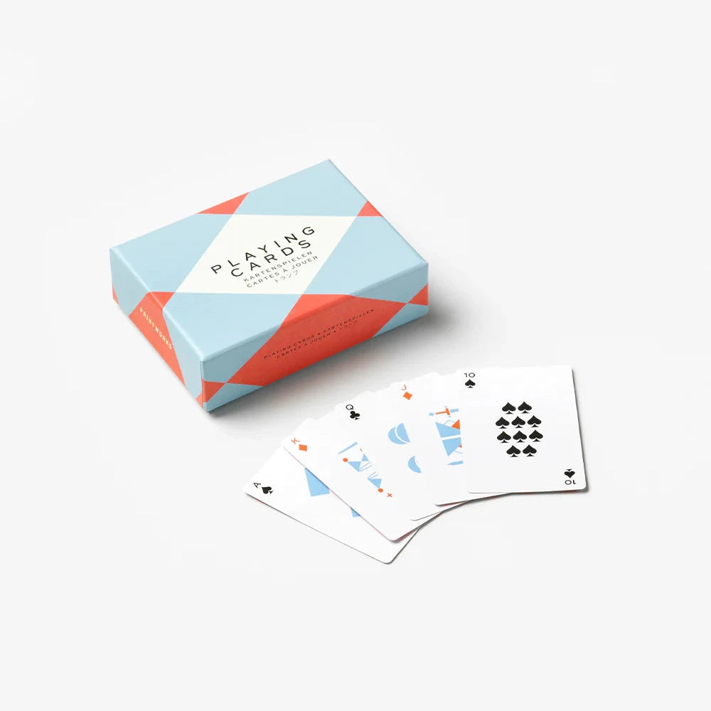 Playing cards with a geometric design on a white background