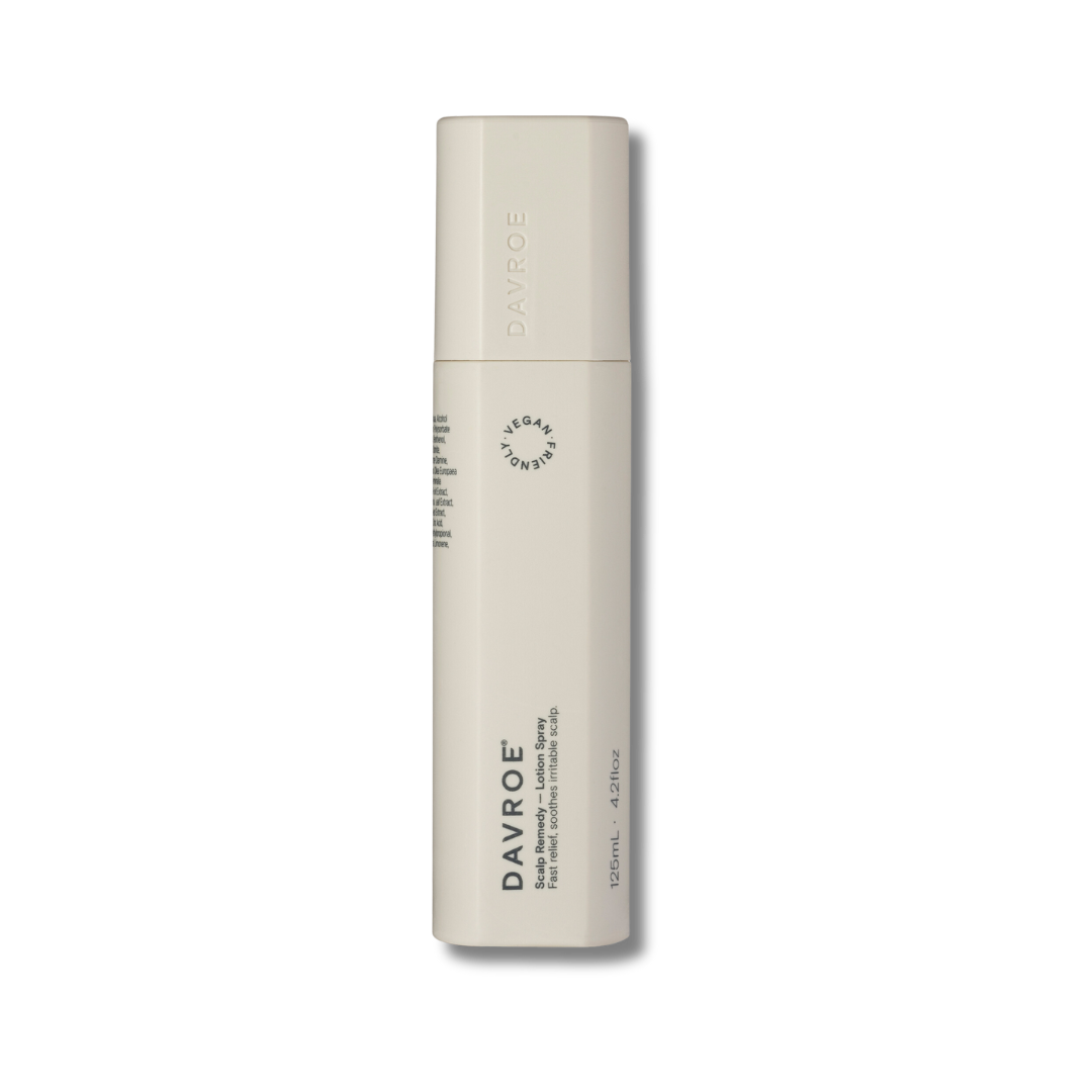 Beige cosmetic bottle with 'DAVROE' branding on a white background