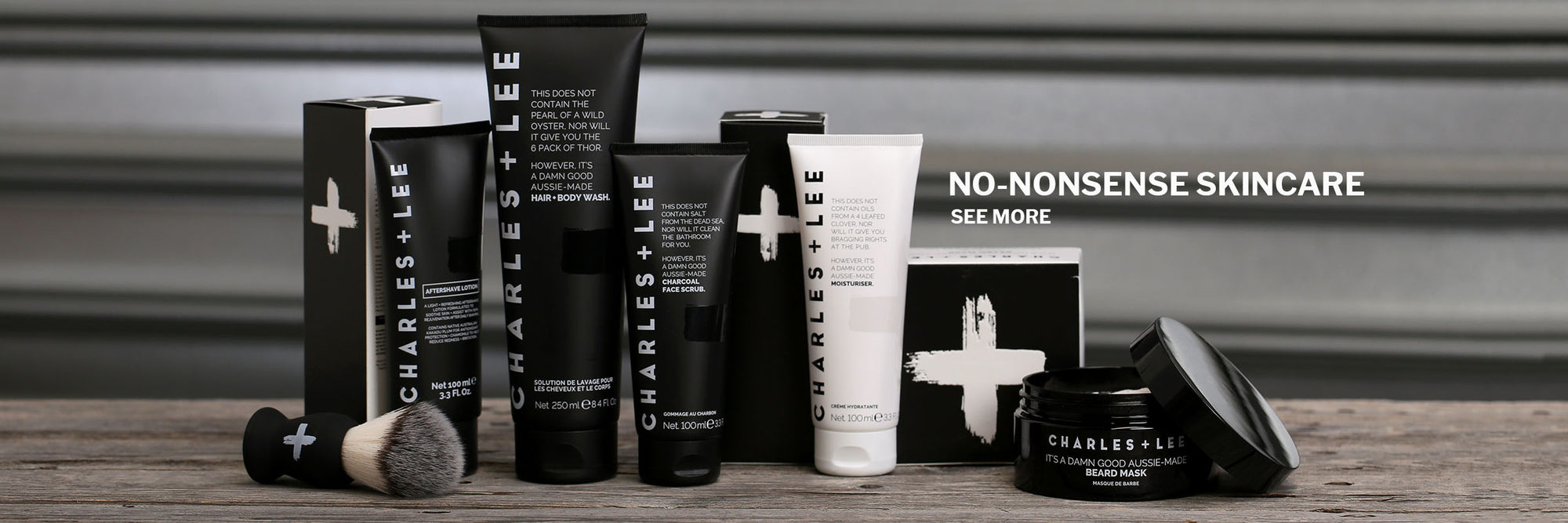Charles and Lee no nonsense skincare products for men on a timber tabletop