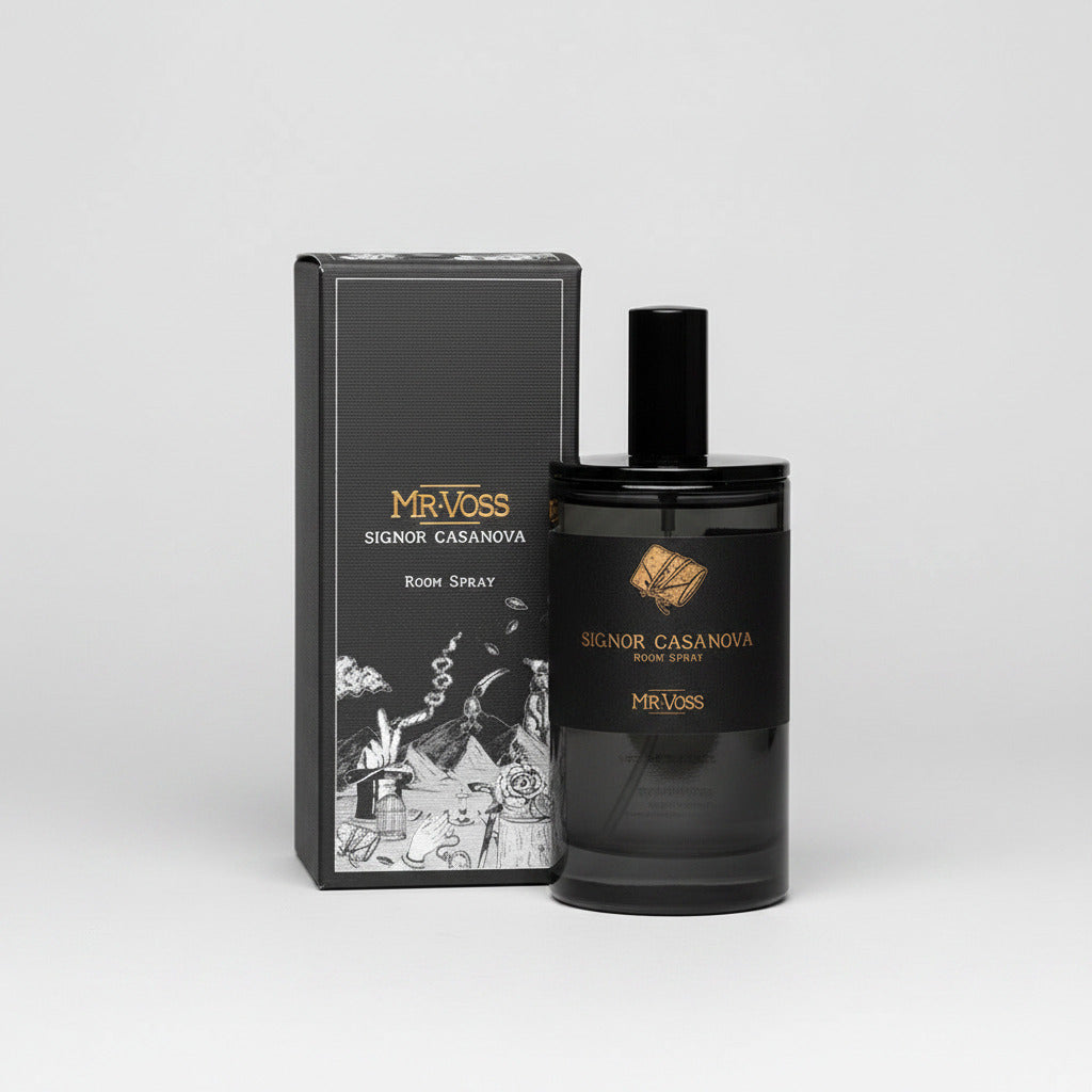 Black perfume bottle and packaging with 'Melfoss' branding on a white background