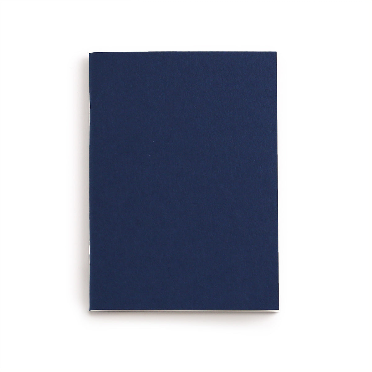 Navy blue cover of the passport sized lined refill