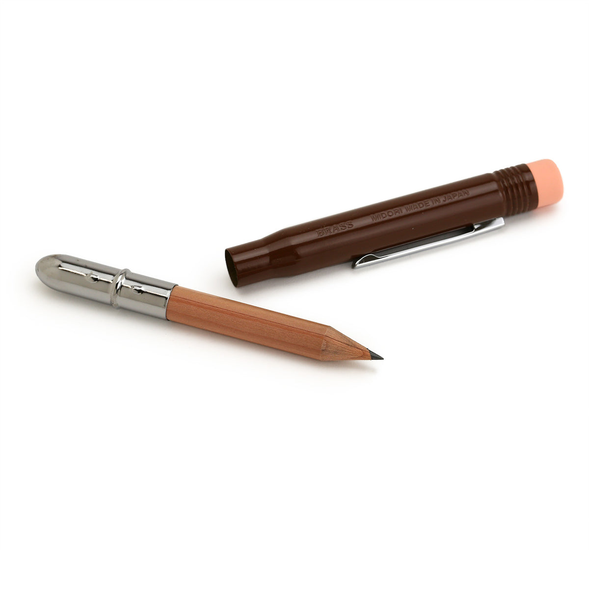 brass brown pencil pulled in to two pieces - pencil with shiny metal end cover and brown  cap with metal clip and eraser