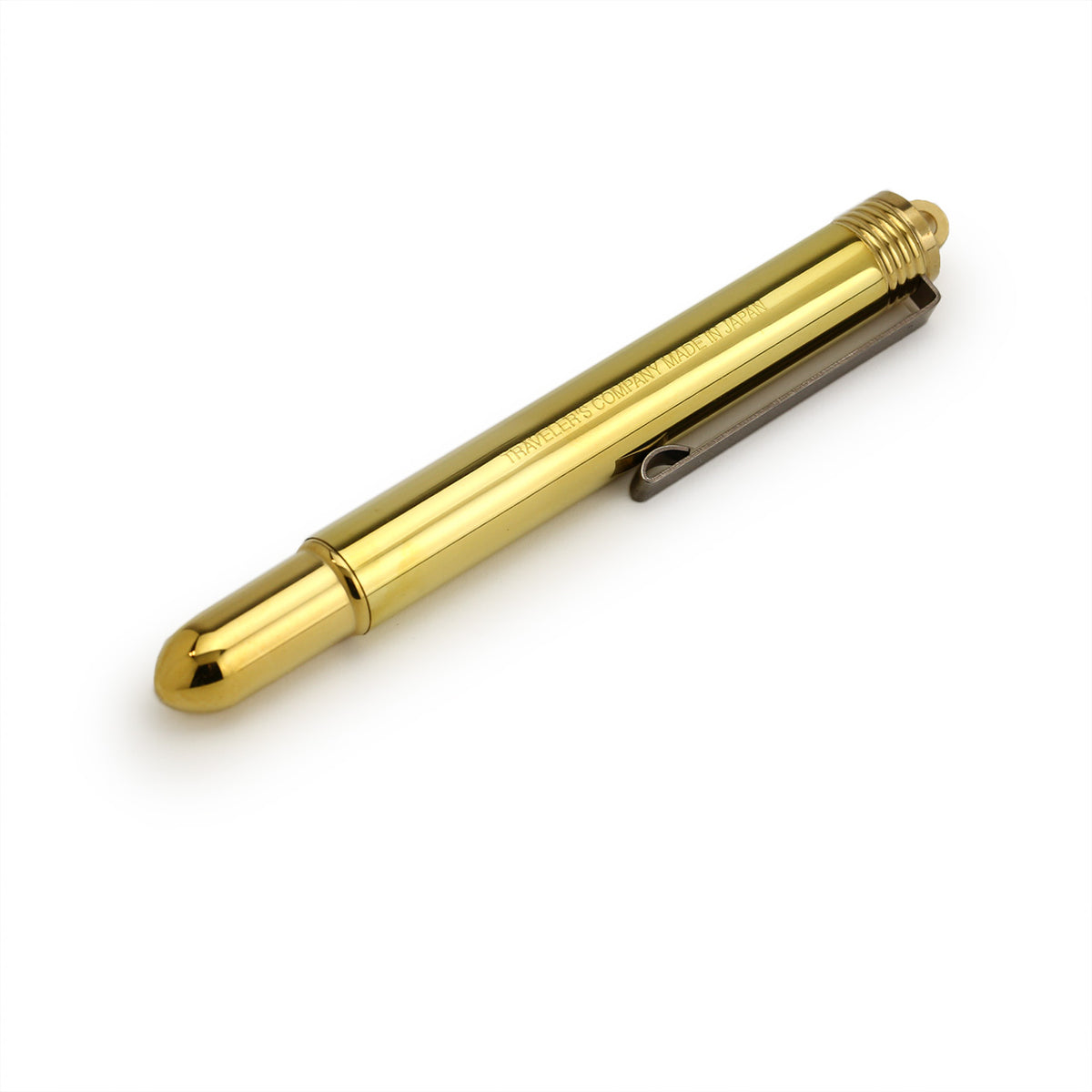 compact brass rollerball pen showing the rustic clip and rounded brass end