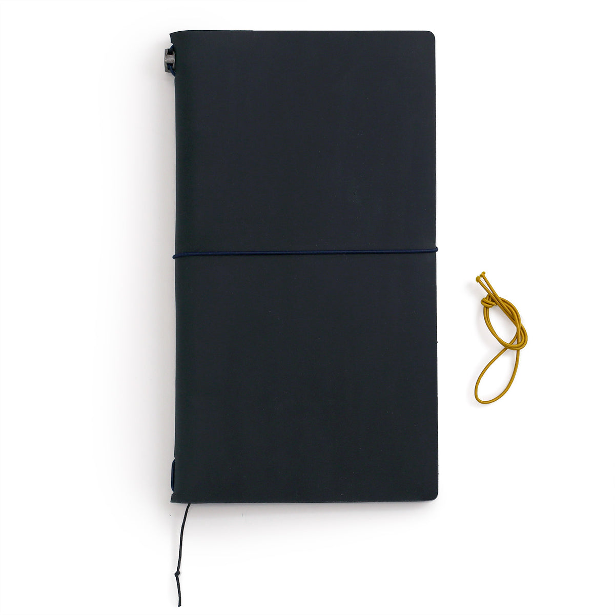 Traveler&#39;s Notebook in dark blue leather showing the extra mustard elastic
