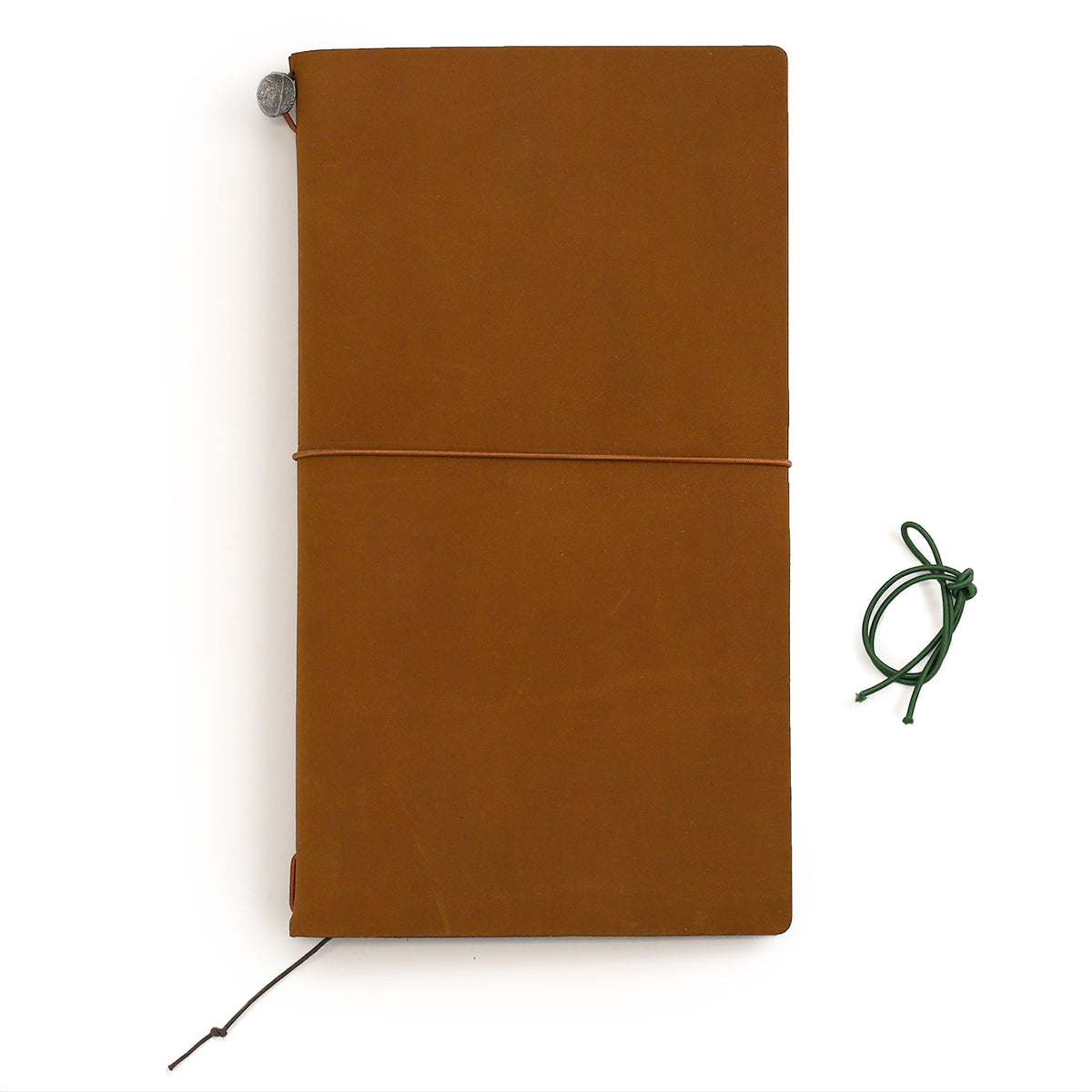 Traveler&#39;s Notebook in camel coloured leather showing the extra dark green elastic