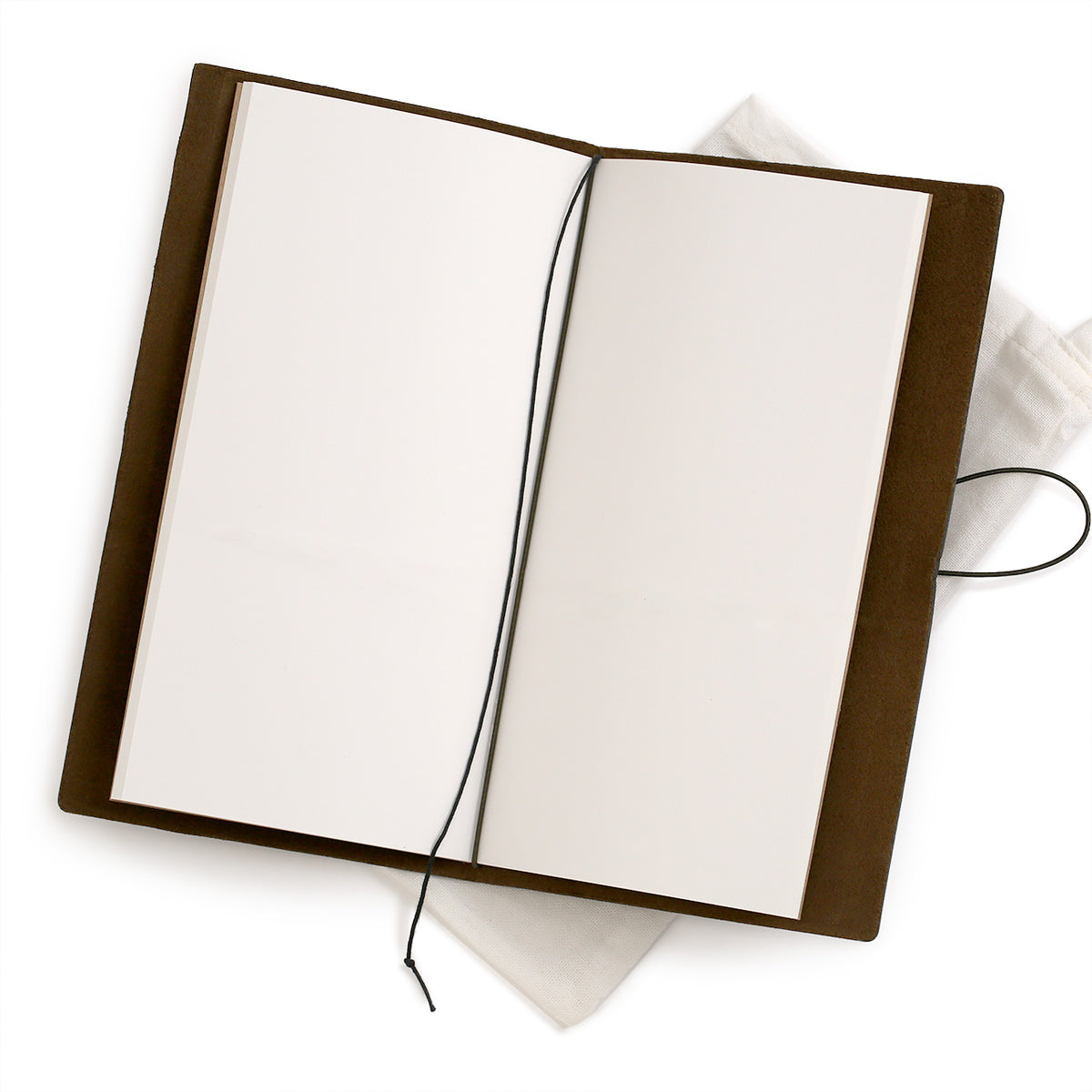 Reggular notebook open to centre spread of blank paper with bookmark and attaching bands