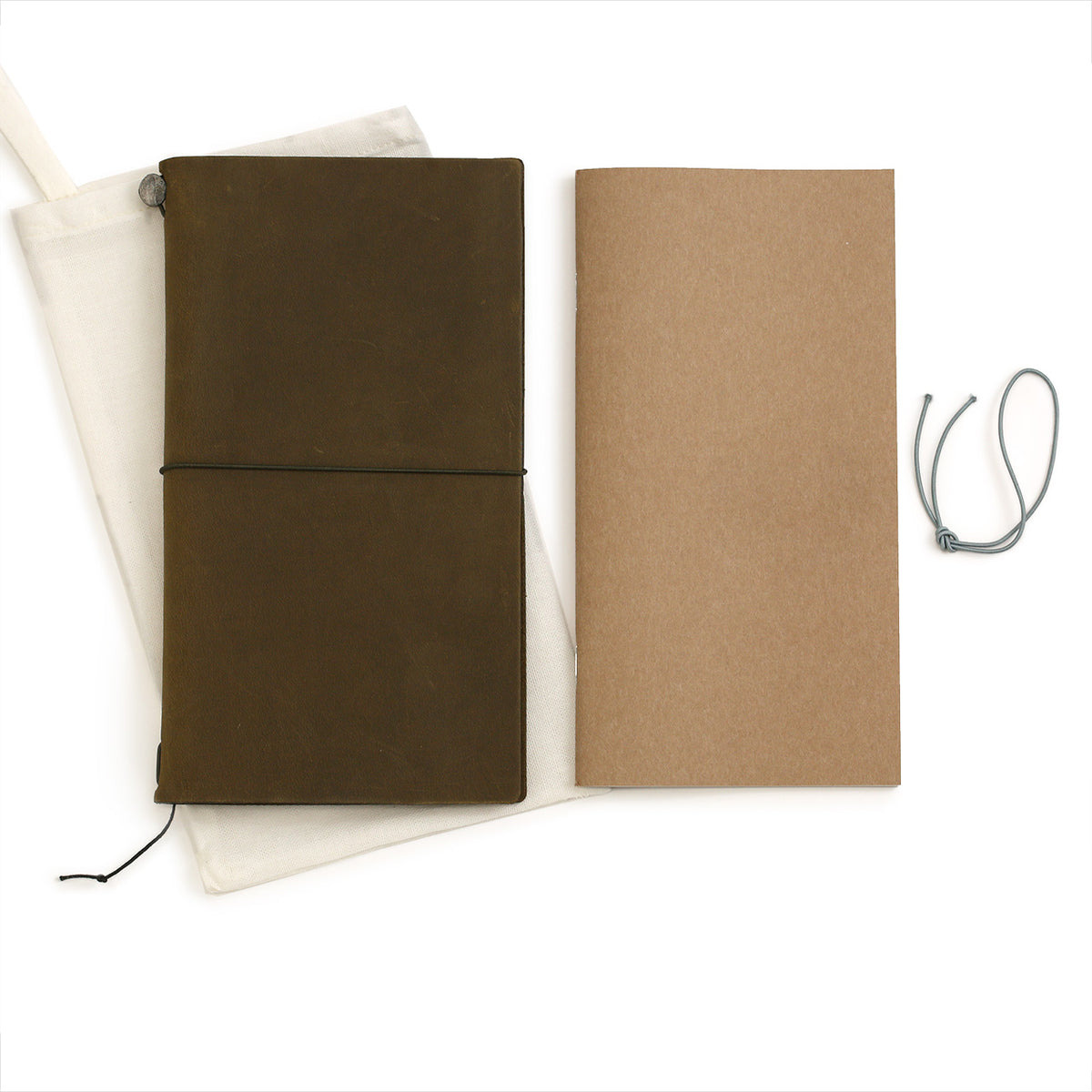 Cotton bag, brown leather notebook cover, refill book with kraft cover and spare elastic